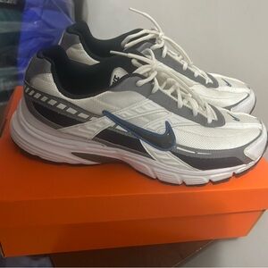 Nike White and Black Sneakers with Blue Swoosh